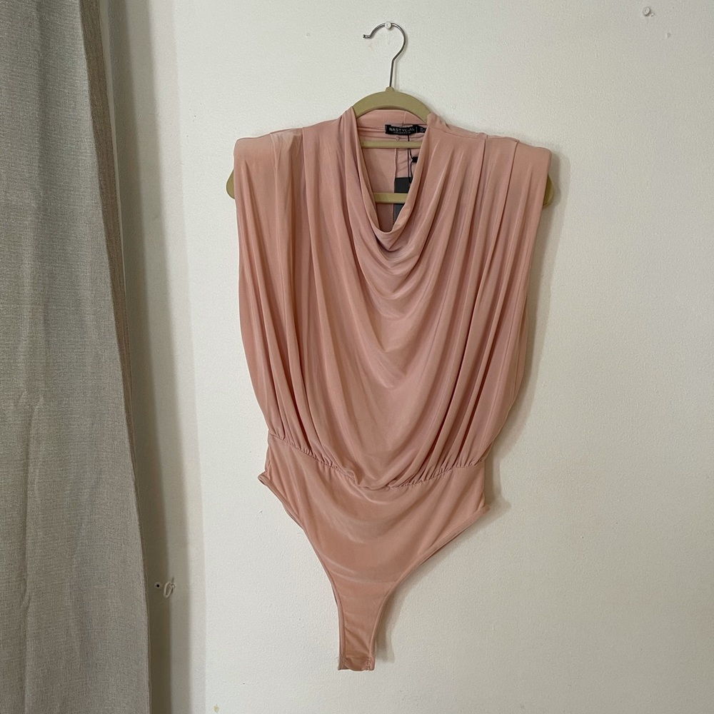 Padded shoulder draped bodysuit